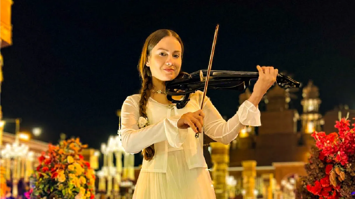 International violinist performing at an elegant event in India